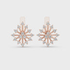 women's floral style diamond and gold earrings are shown from 360 degree angle against a white background.