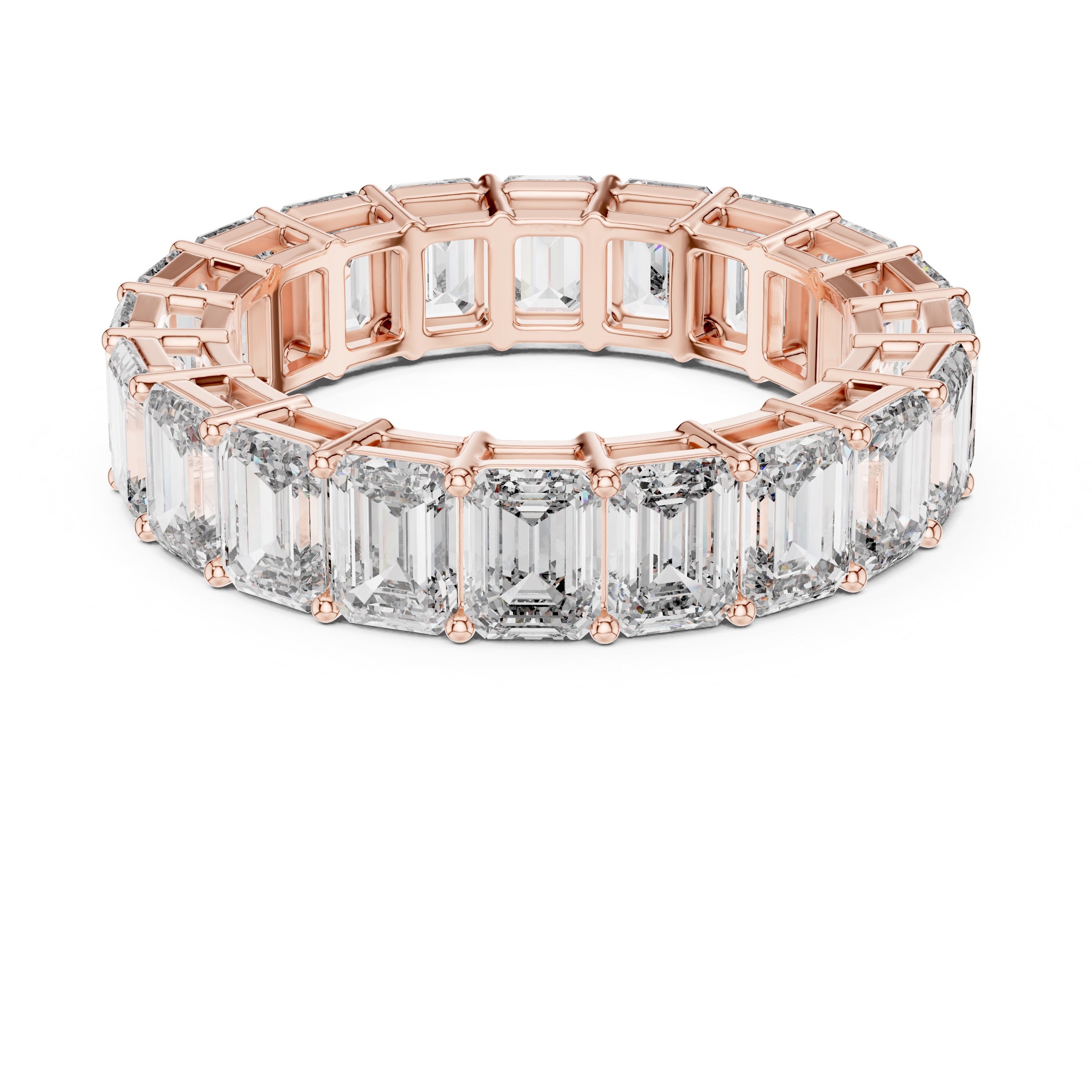 Rose gold ring with emerald-cut natural diamonds on a white background