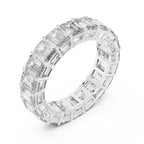 White gold ring with emerald-cut natural diamonds on a white background