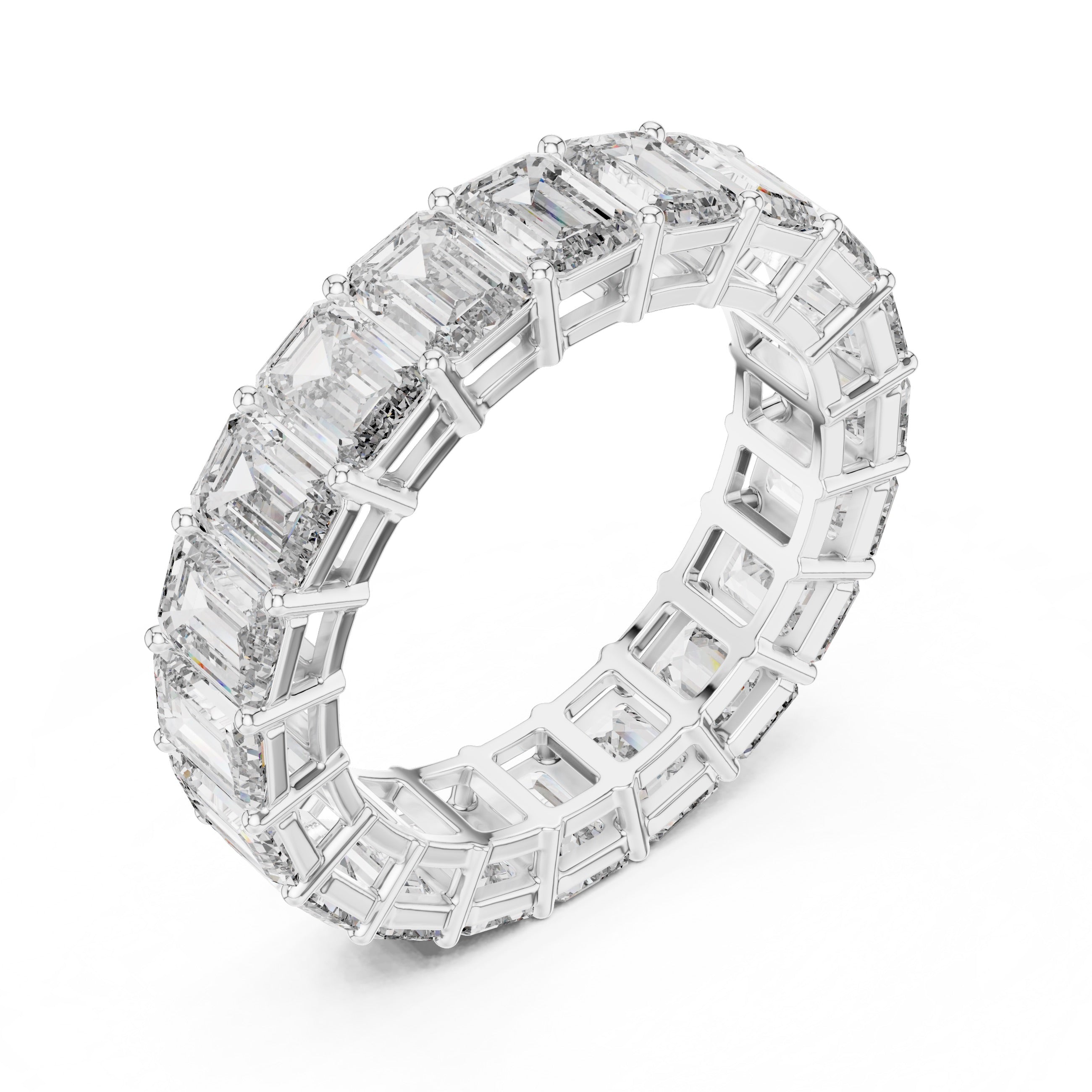 White gold ring with emerald-cut natural diamonds on a white background
