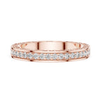 Rose gold ring with natural diamonds on a white background