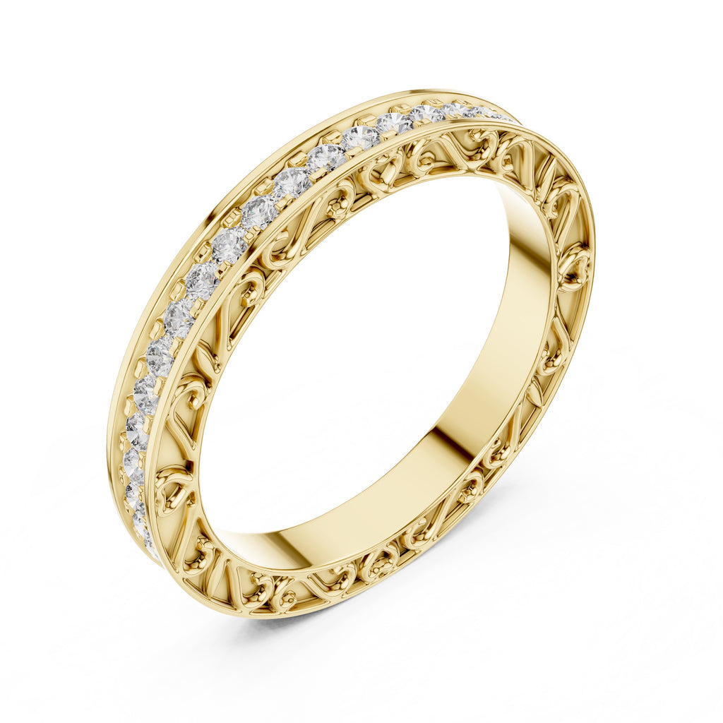 Gold ring with natural diamond accents on a white background
