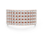 Stack of lab grown diamond-encrusted rings with rose gold band on a white background