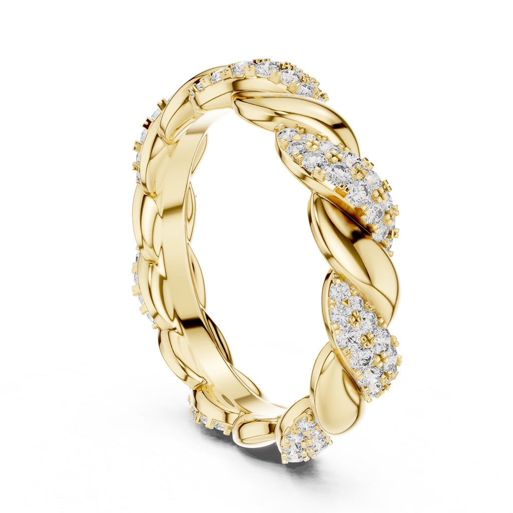 Yellow gold ring with diamond accents on a white background
