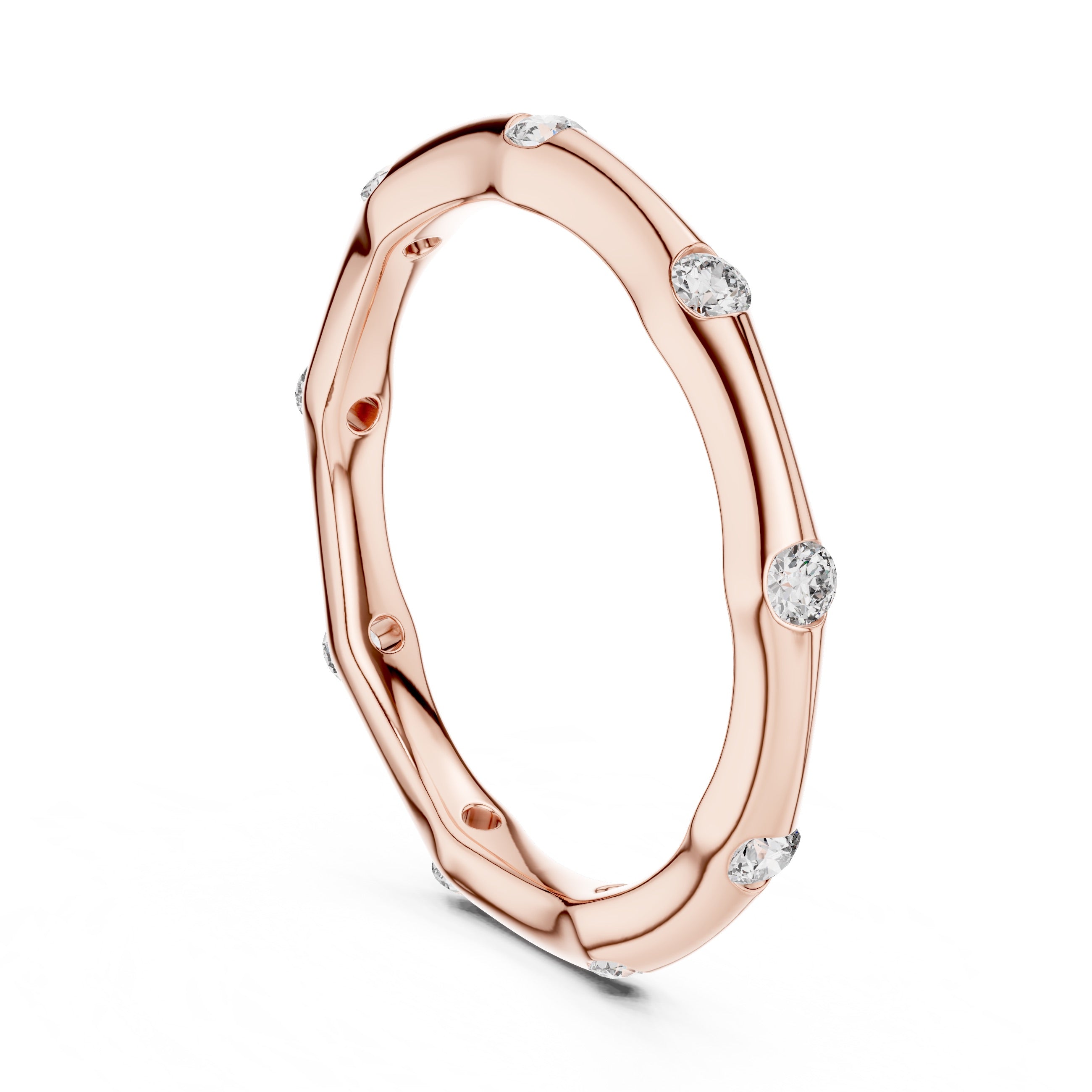 Rose gold ring with embedded diamonds on a white background