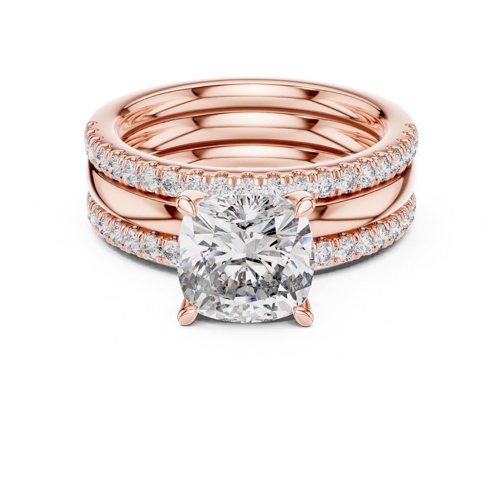 Rose gold ring with a large diamond and smaller diamonds on a white background