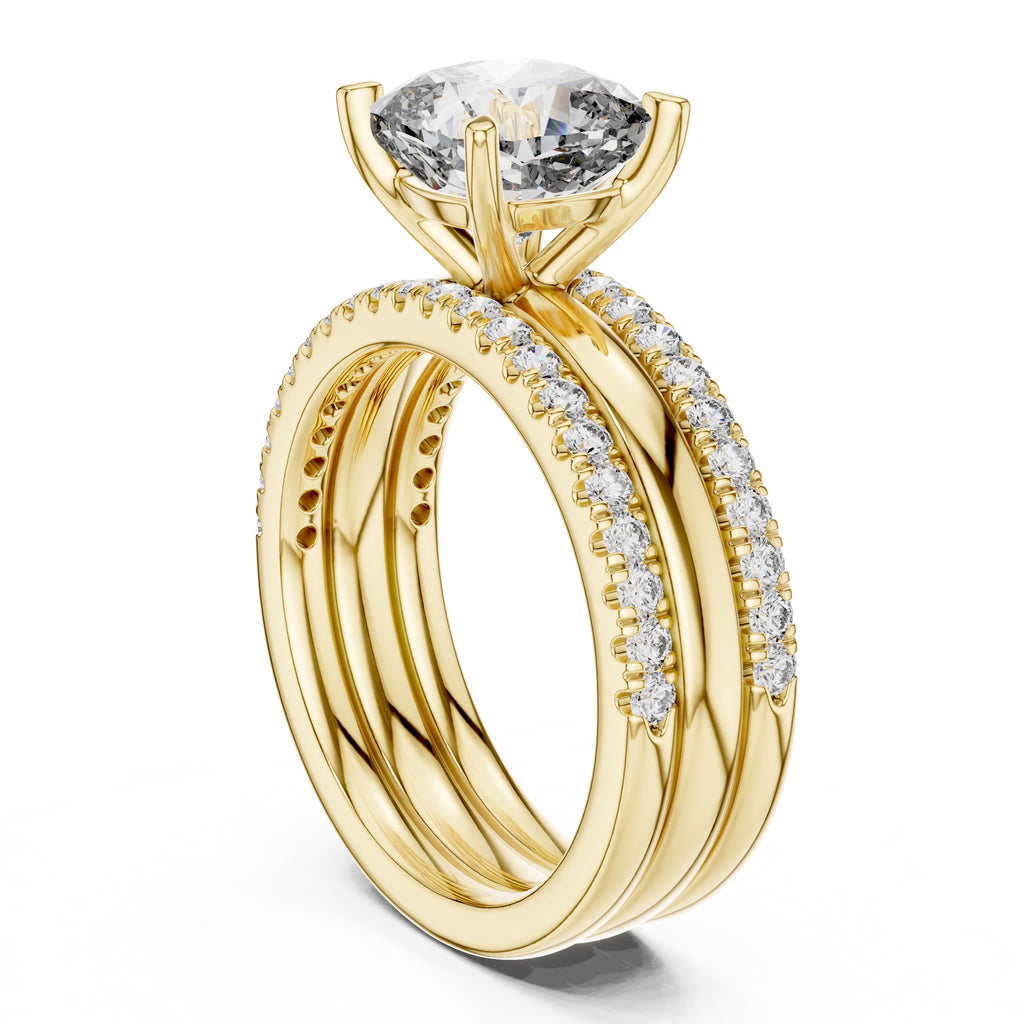 Yellow gold ring with a large diamond and smaller diamonds on the band against a white background