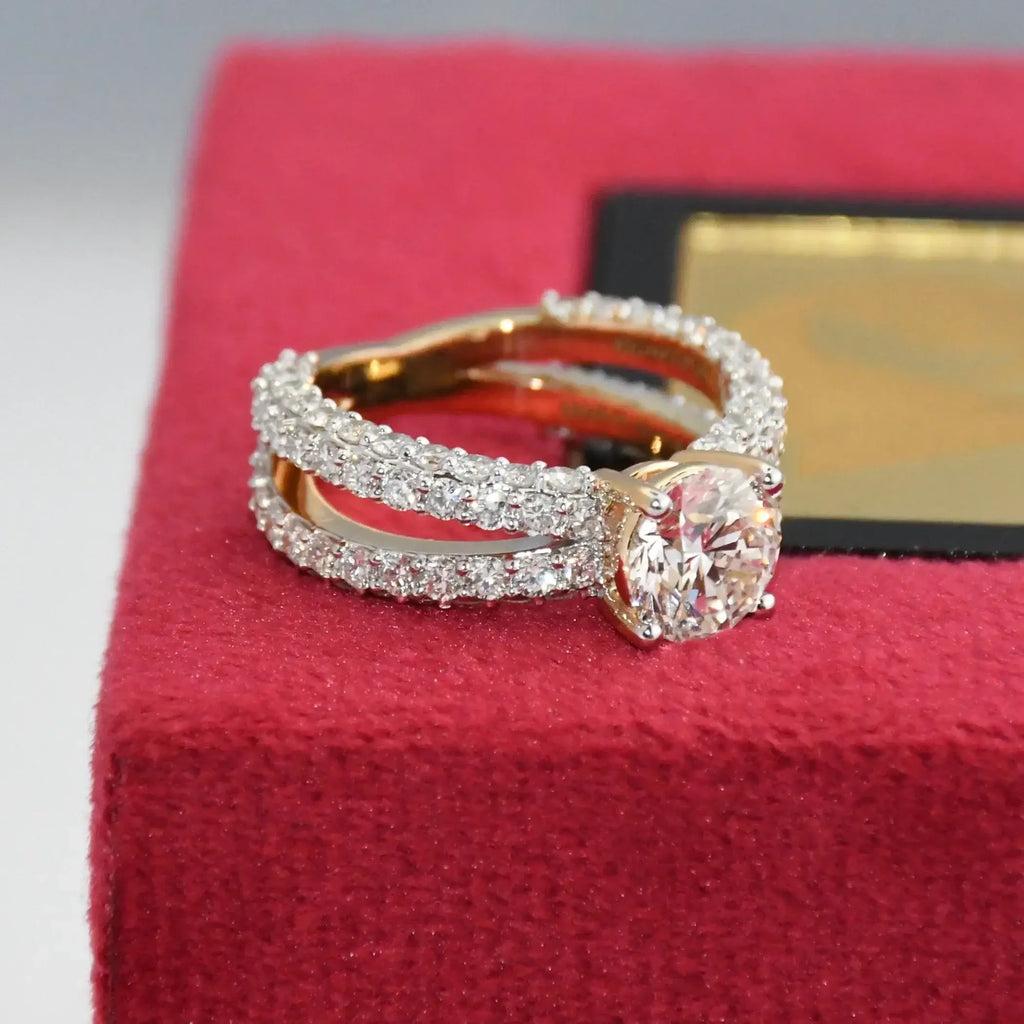 Real diamond ring on a red jewelry box with a blurred background