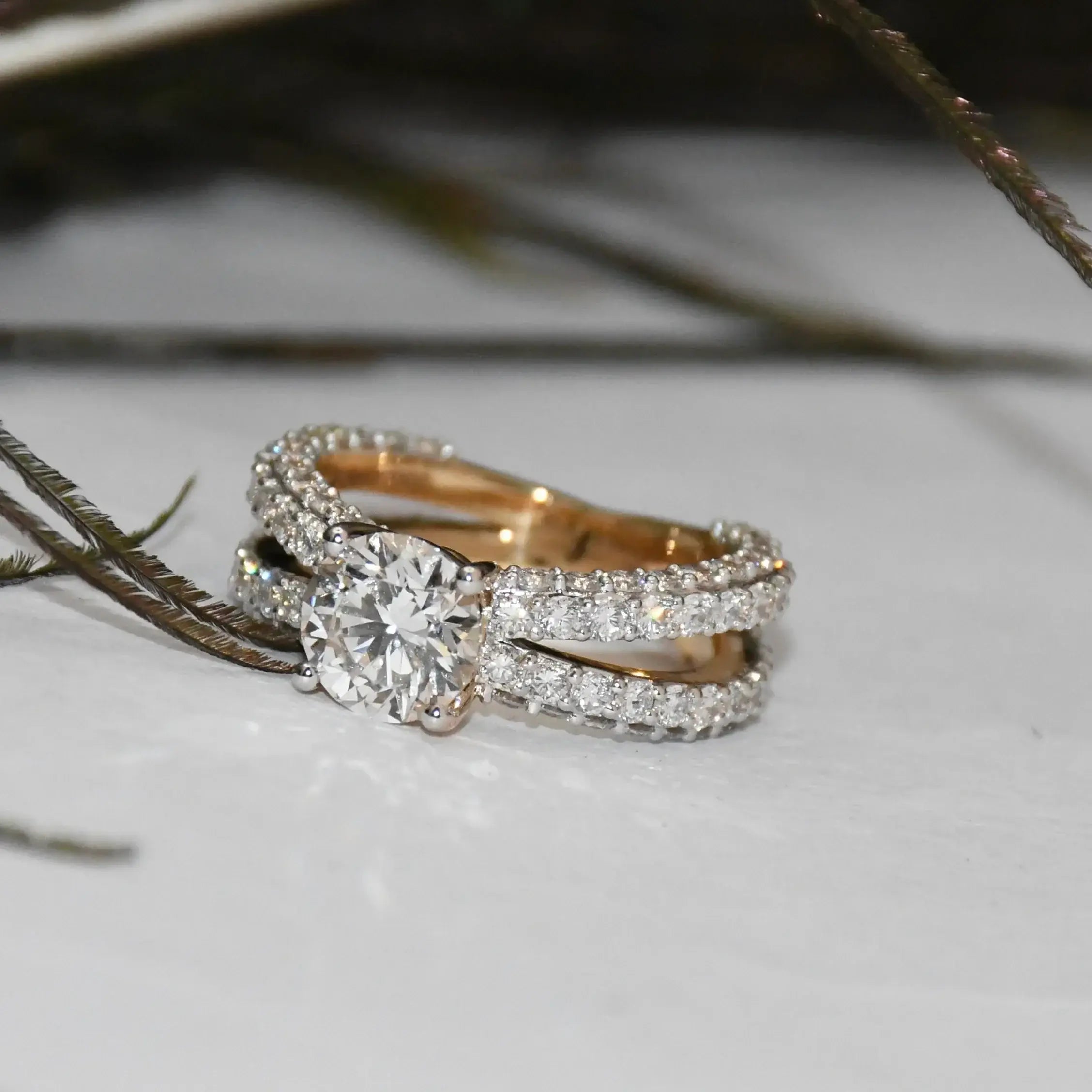 Real diamonds ring on a light surface with blurred background
