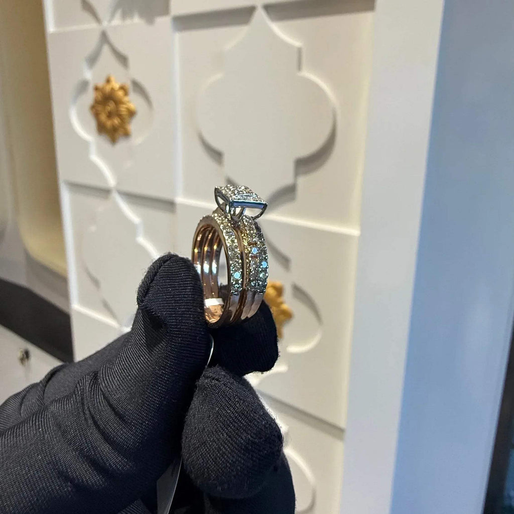 A close-up image of a handcrafted natural diamond ring set in 14kt solid gold, showcasing the band with embedded diamonds.