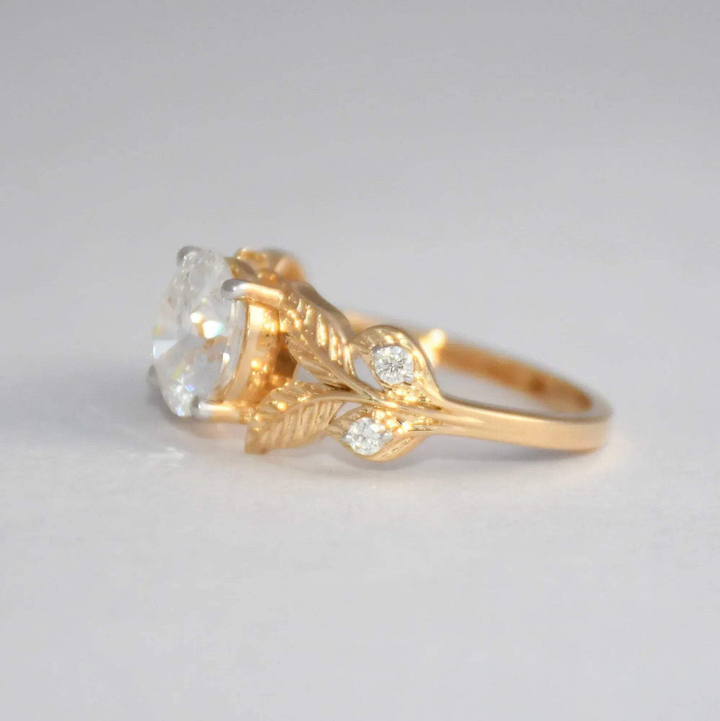 Gold ring with a diamond on a light gray background.