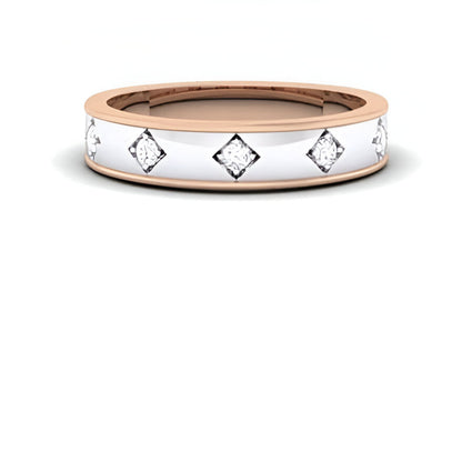 two tone gold ring with diamond accents on a white background