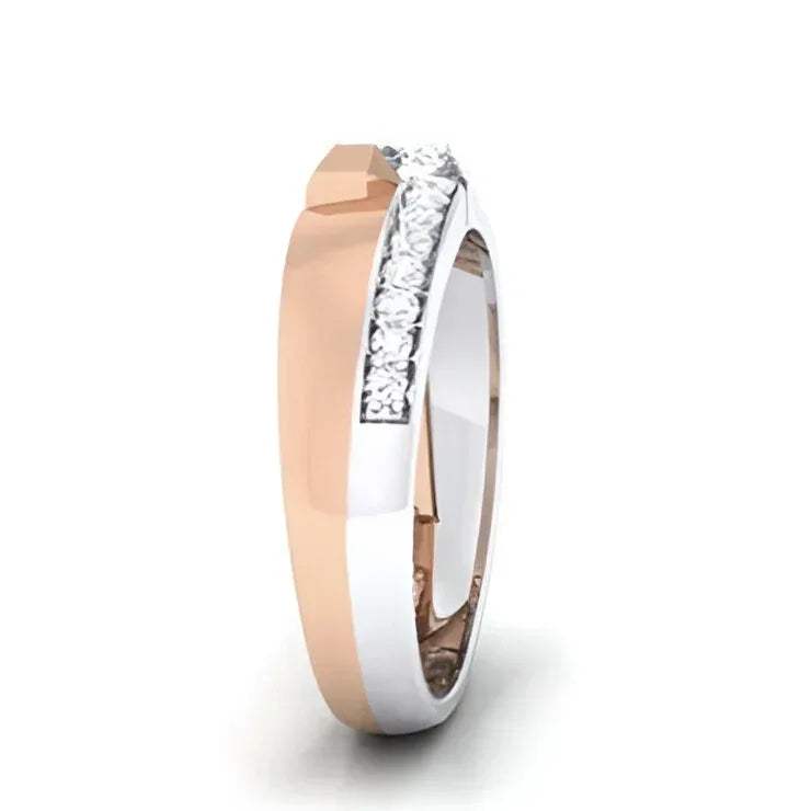 Two-tone ring with diamonds on a white background