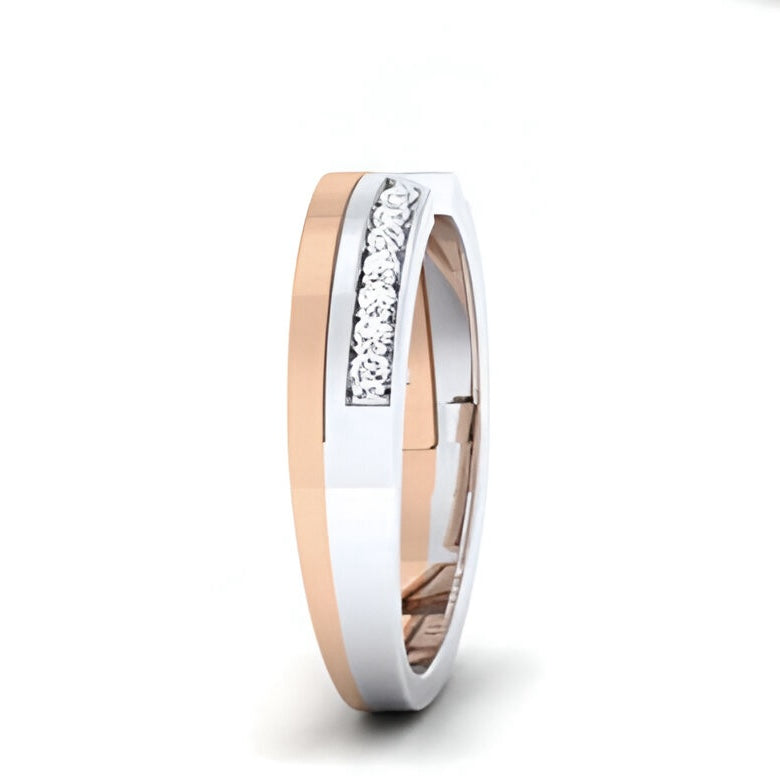 Two tone rose gold and white gold wedding band with diamond accents on a white background
