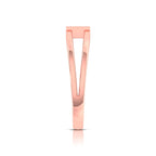 Rose gold diamond ring on a white background