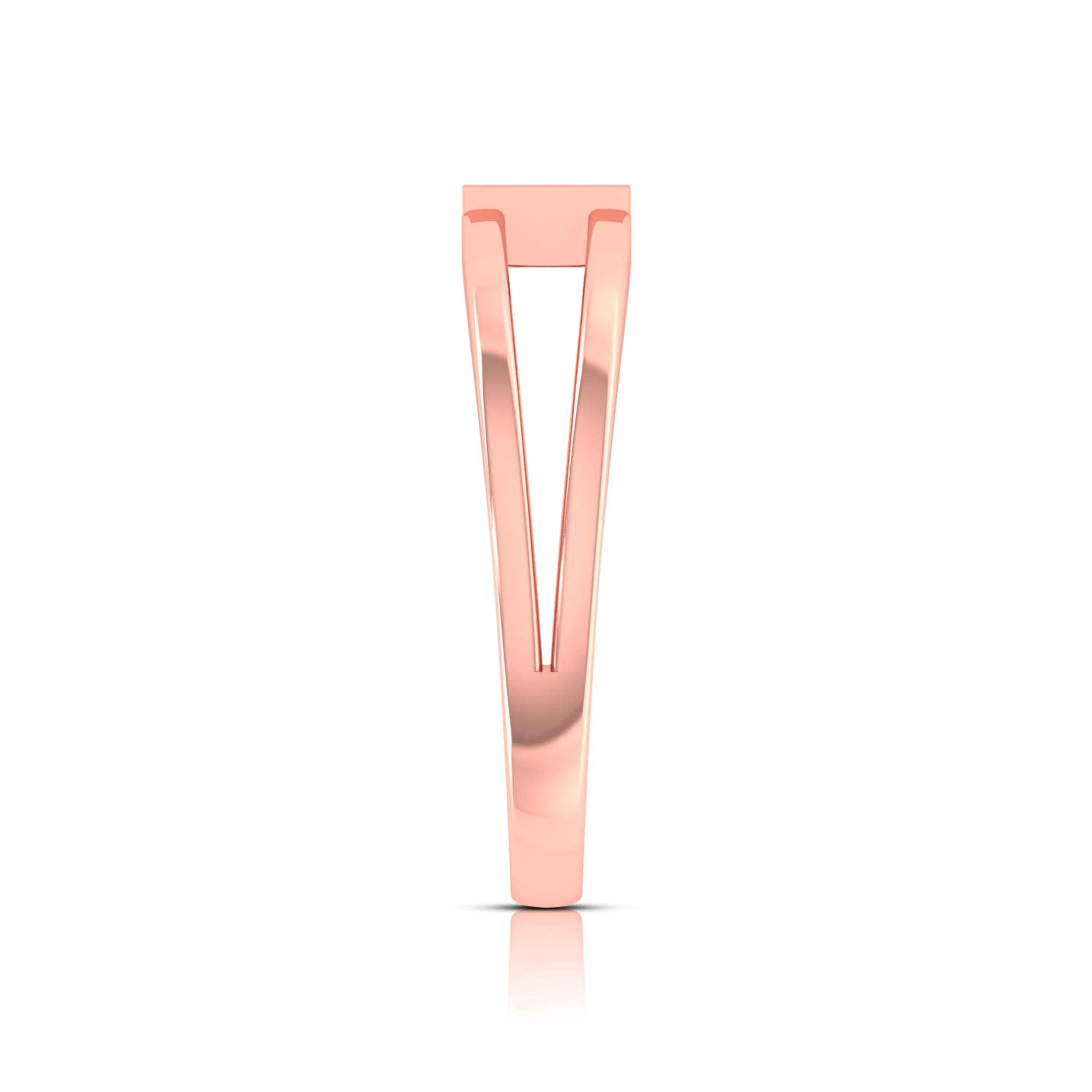 Rose gold diamond ring on a white background