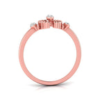 gold ring with round shape diamonds on a white background
