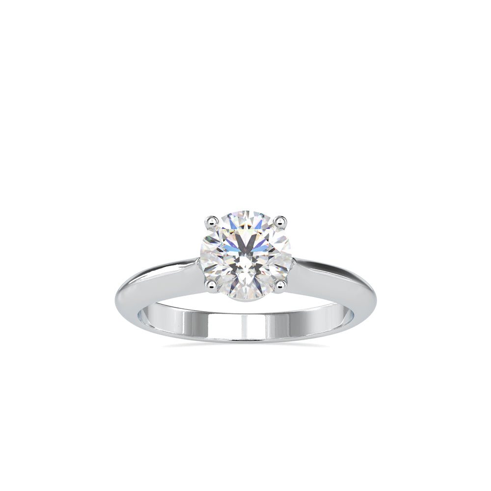 gold ring with a solitaire diamond on a white background