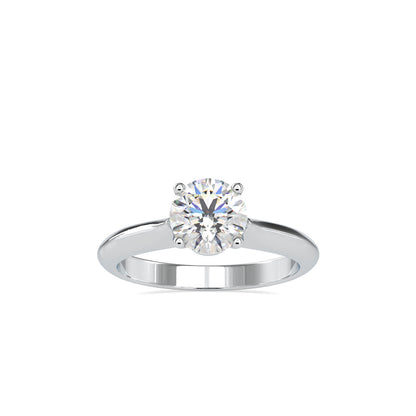 gold ring with a solitaire diamond on a white background