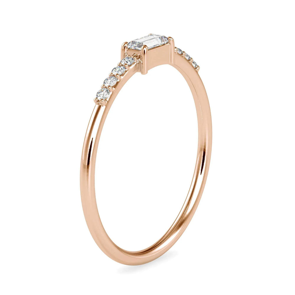 gold ring with diamonds on a white background