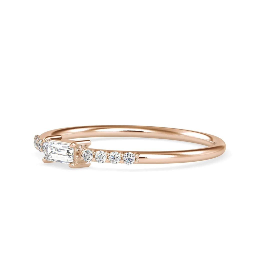gold ring with diamonds on a white background