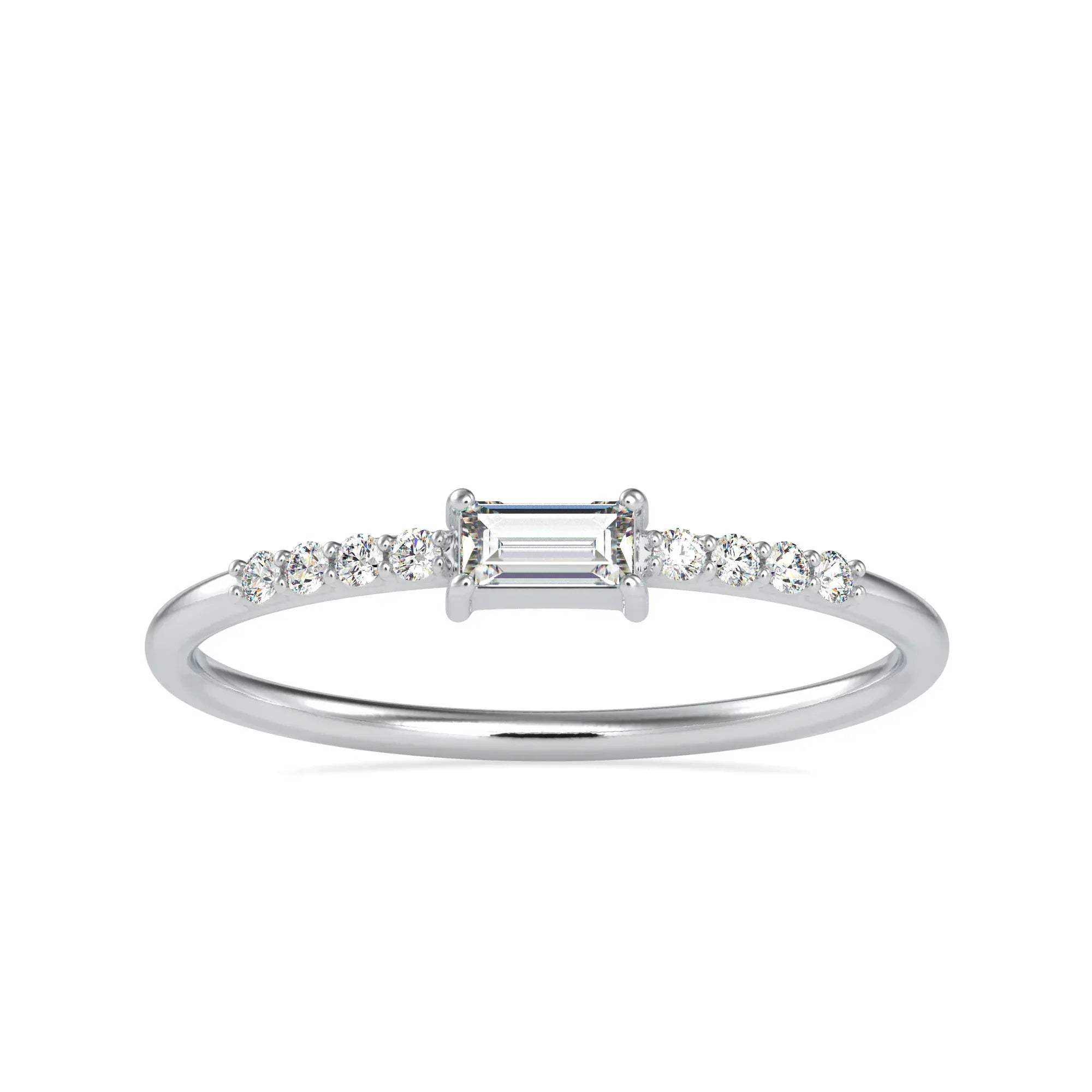 Diamond ring with a central emerald-cut diamond and smaller diamonds on a white background