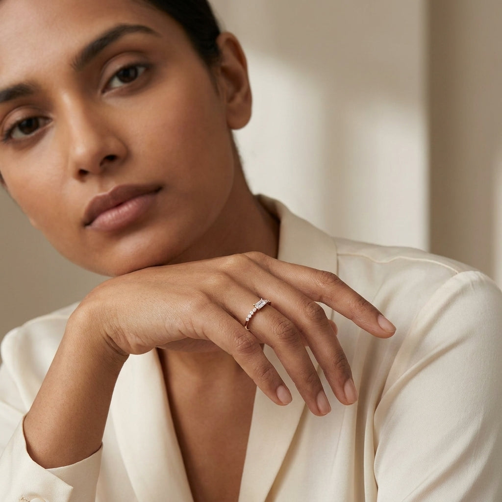 gold ring with diamonds worn by a woman