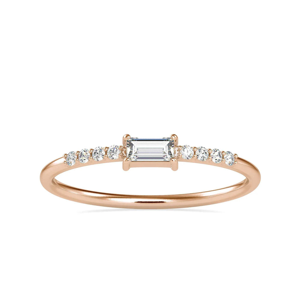 gold ring with diamonds on a white background