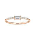 gold ring with diamonds on a white background