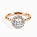gold ring with a diamond on a white background