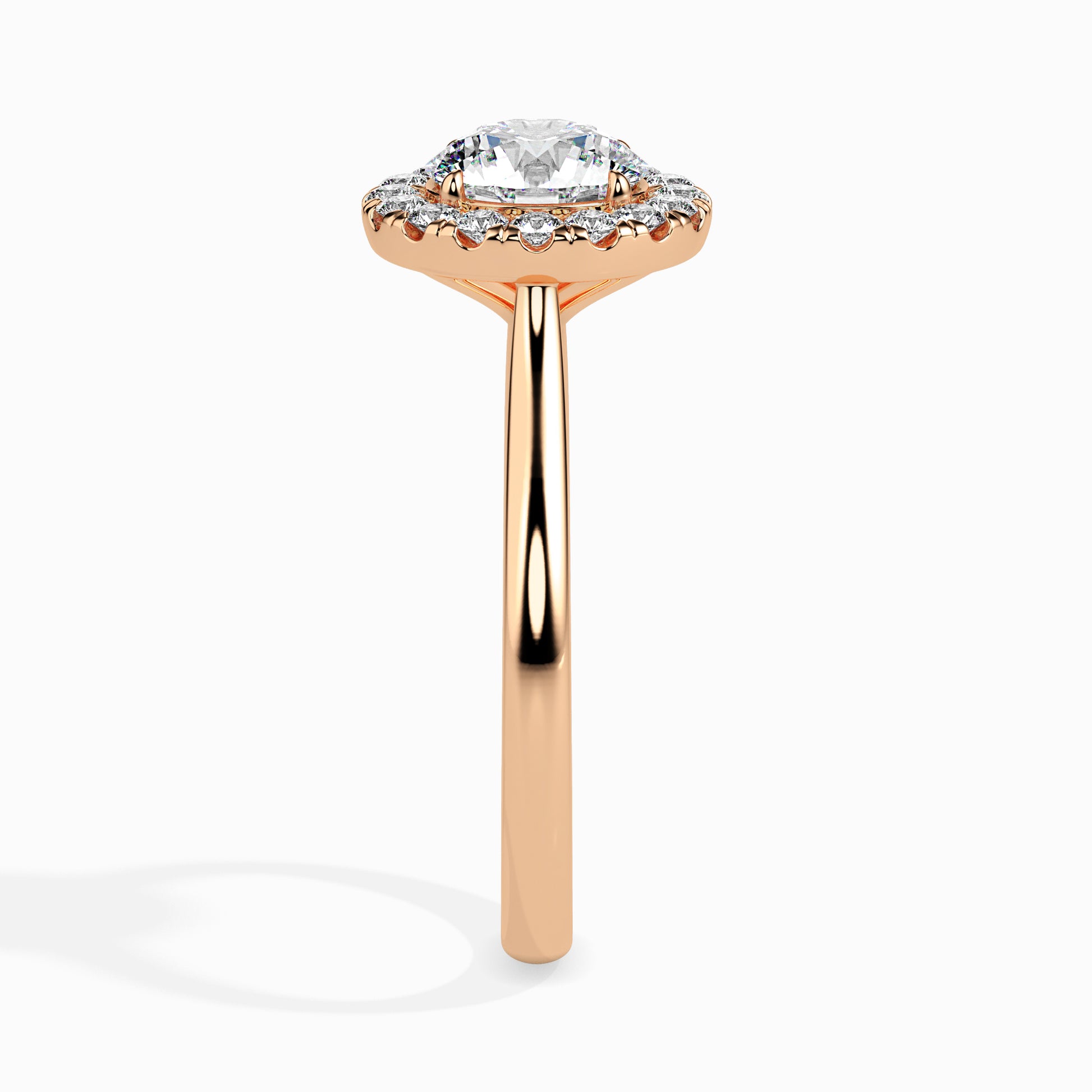 Rose gold ring with a diamond on a white background