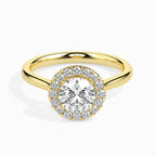 Gold ring with a diamond on a white background