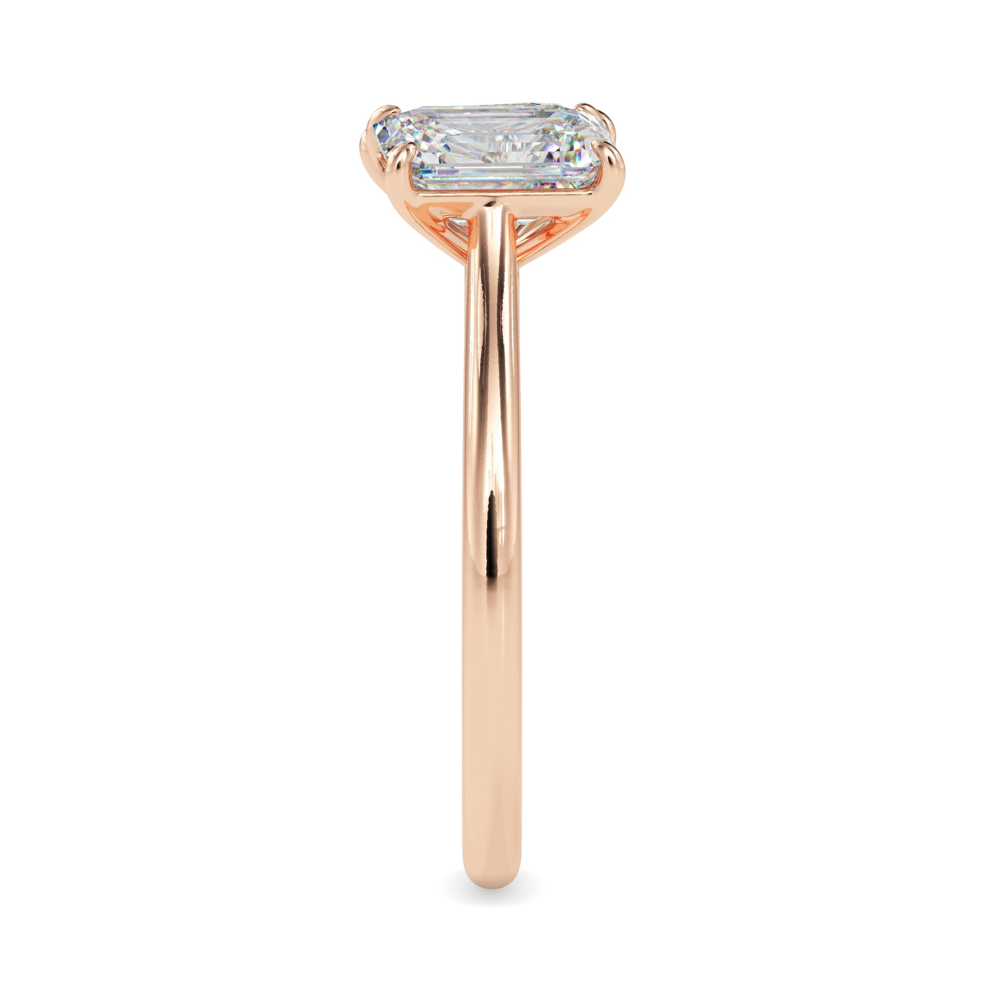 Rose gold ring with a diamond on a white background