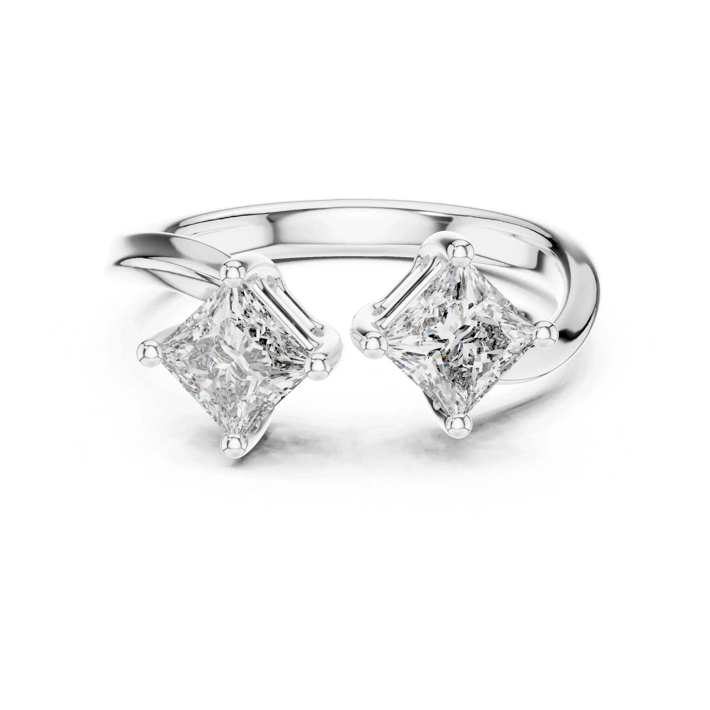 White gold ring with two princess-cut  real diamonds on a white background