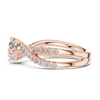 Rose gold ring with real diamonds on a white background