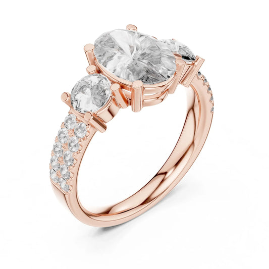 Rose gold ring with three large clear real diamonds with some small diamonds on a white background
