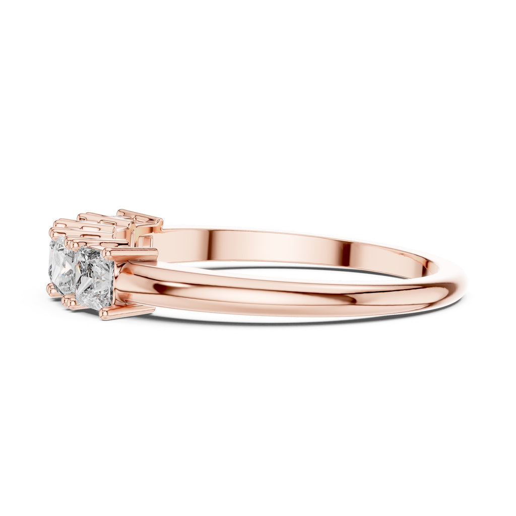 Rose gold ring with a diamonds on a white background