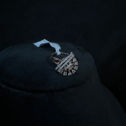 A handcrafted natural diamond solid gold ring displayed on a mannequin bust, with a brilliant cut diamond in a gold band.